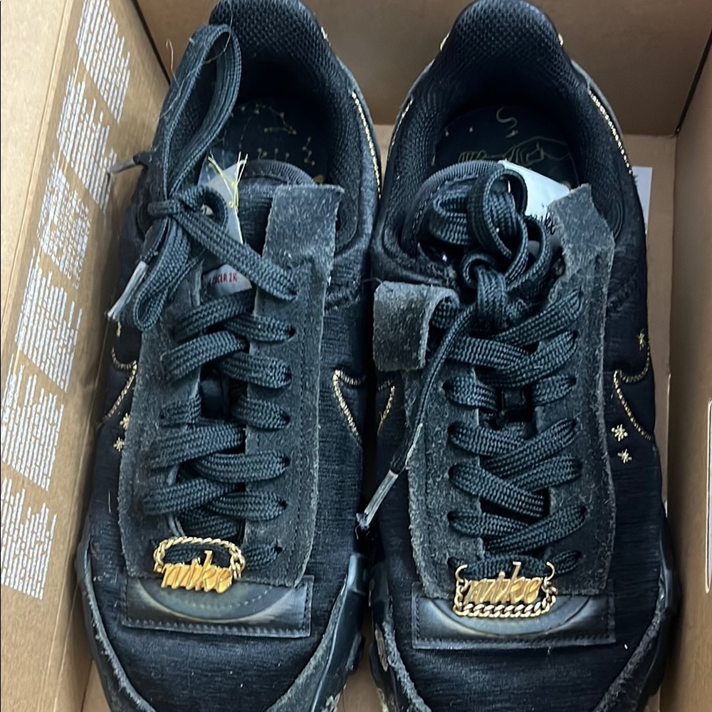 Nike Black and Gold Low-Top Sneakers